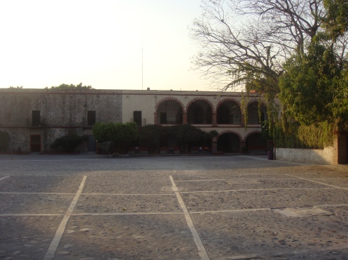The patio with offices and boy's dorms 